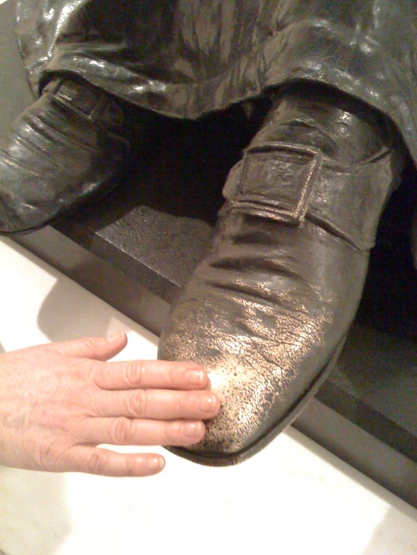 Touching the toe of Justice Marshall's statue for good luck Touching the toe of Justice Marshall's statue for good luck.