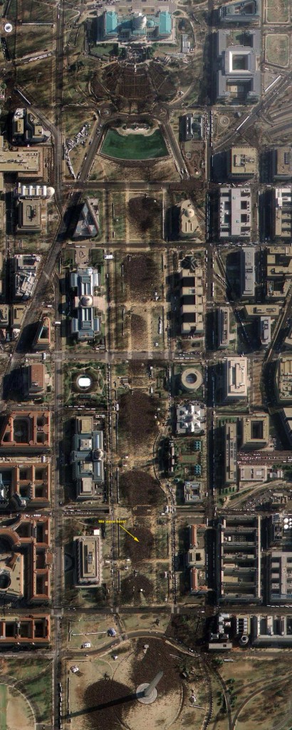 This image provided by GeoEye Satellite Image shows Washington D.C.'s National Mall and the United States Capitol (top), in Washington D.C. on Tuesday, Jan. 20, 2009 taken at 11:19AM EDT during the inauguration of President Barack Obama. The image, taken through high, wispy white clouds, shows the masses of people between the Capitol and the Washington Monument. (AP Photo/GeoEye Satellite Image)